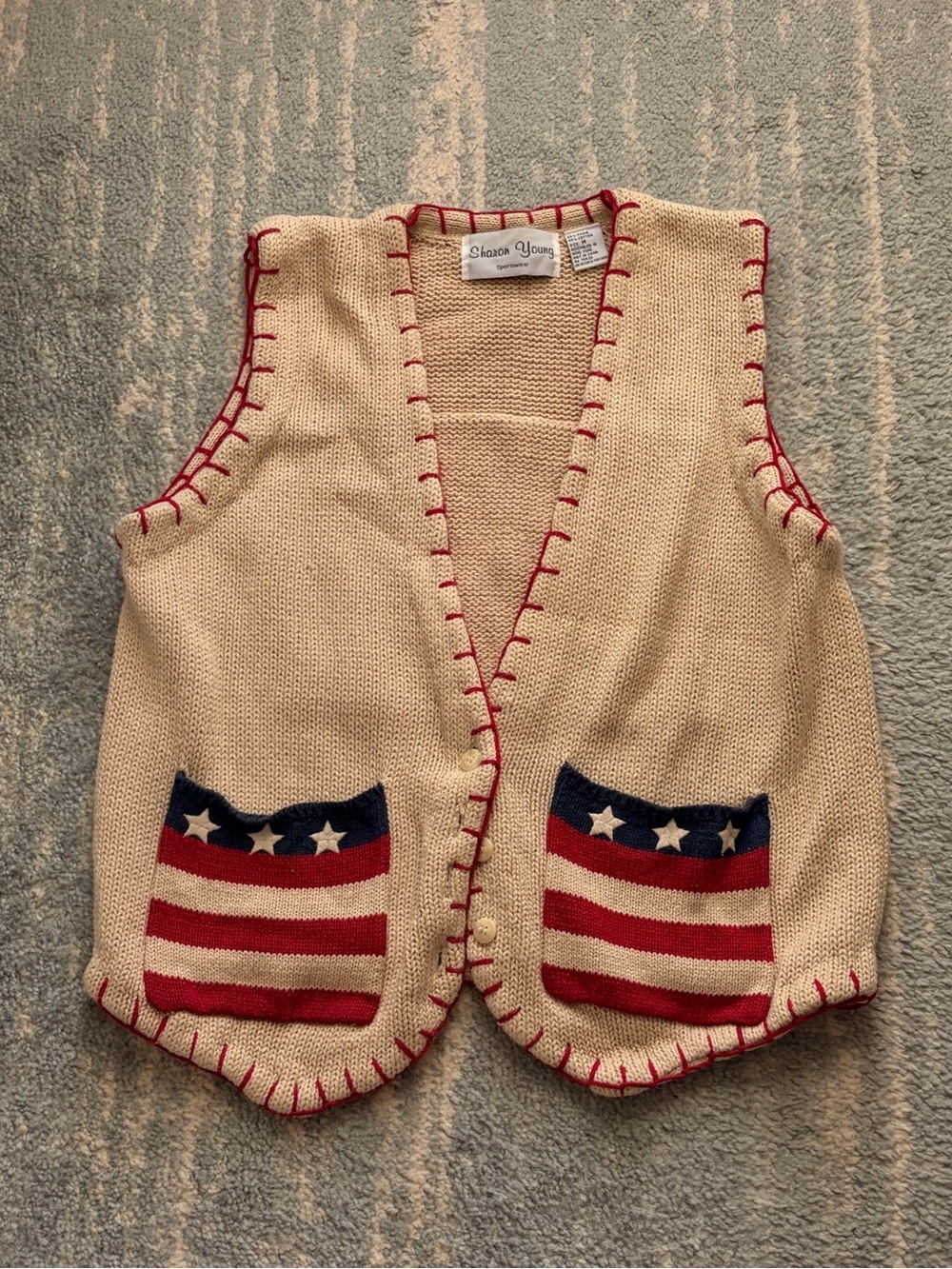 Sharon Young Cream Knit Vest with Red & Navy Pocket Stars